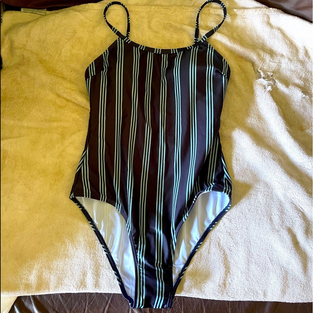 A striped swimsuit that’s navy and light blue vertical stripes. SZ. S never worn
